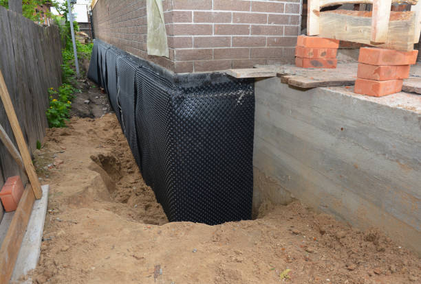Happy homeowners after waterproofing job in South Whitley